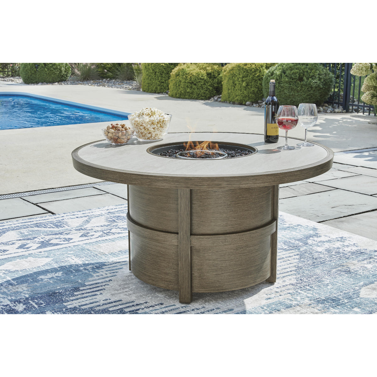 Signature Design by Ashley Rainier Ranch P701-776 Round Fire Pit Table IMAGE 6
